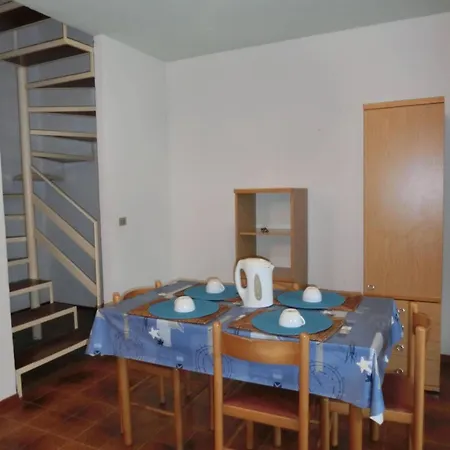 Two Story House With Enclosed Garden Bibione