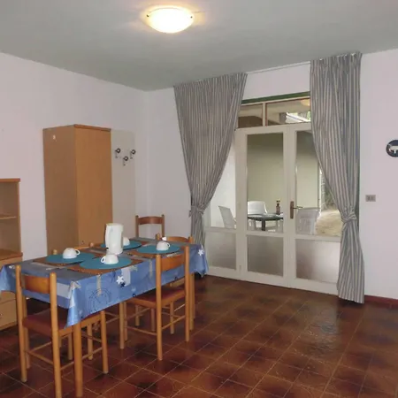 Two Story House With Enclosed Garden Bibione
