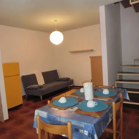 Two Story House With Enclosed Garden Bibione